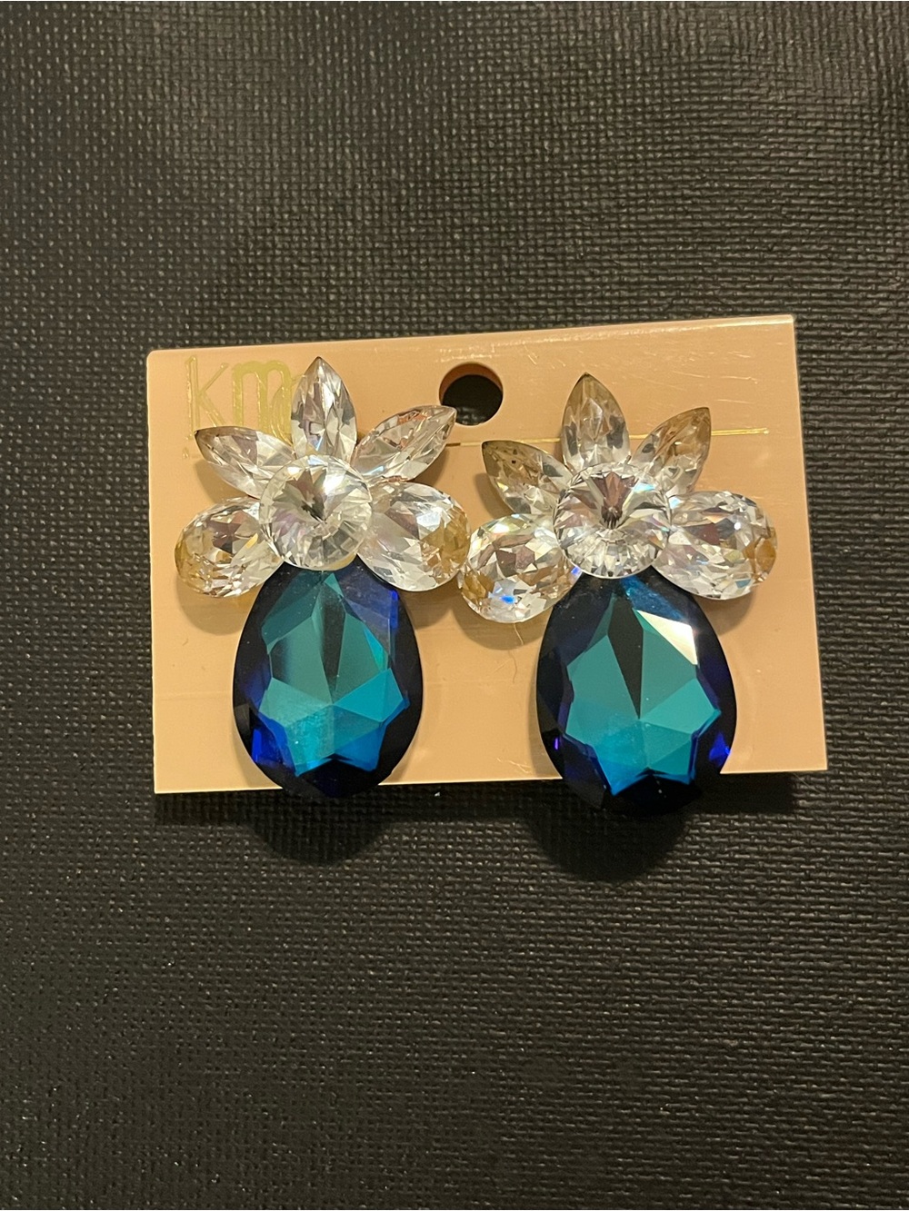Kiss Me Quick Crystal Flower Drop Clip-On Earrings in Blue and Clear 1 7/8” long